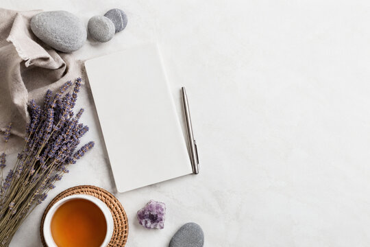 Mindfulness Flat Lay with Stones Lavender Blank Journal and Tea