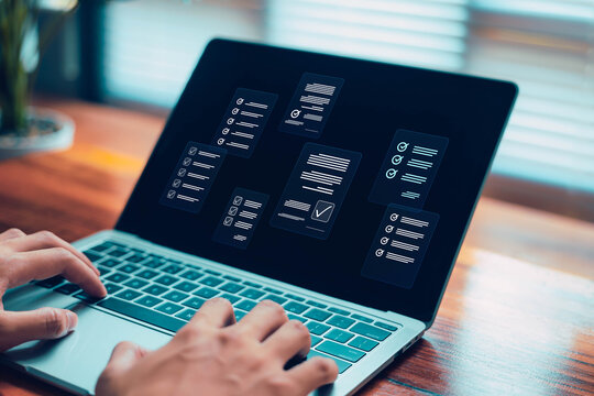 Business forms, checklists business people are marking digital checkboxes on their laptops. Document verification, checklists, task management, review process, modern digital workspace.