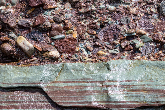 Gaspesie, Quebec, 07 June 2026 : A close-up view of a rock formation reveals distinct geological layers and varied mineral composition.