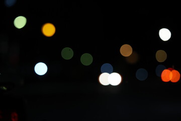 Abstract City Traffic Bokeh Background with Defocused Night Lights © Sam