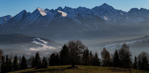 Majestic winter panorama of snow covered Tatra Mountains in Poland, view from Lapszanka and Czarna Gora © FotoBastek