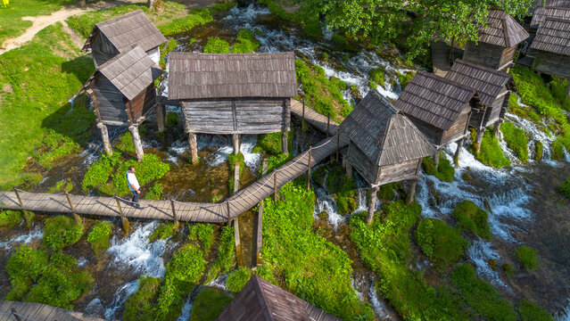 Aerial view of traditional wooden watermills on Pliva lakes near Jajce town