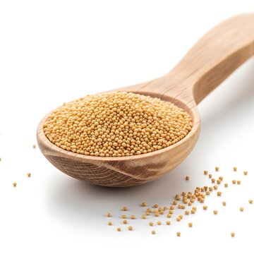 Yellow Mustard Seed Piled in Wooden Spoon on White Background