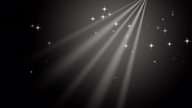 Golden light rays with twinkling sparkle particles overlay on black background