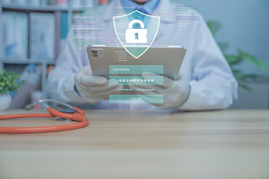 A medical professional is using a tablet displaying a digital security padlock icon, symbolizing patient data protection, cybersecurity in healthcare, HIPAA compliance, and secure medical information 