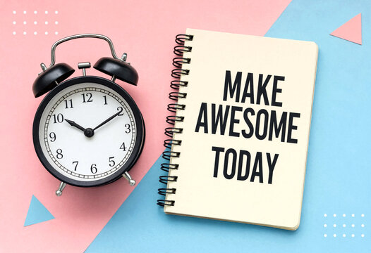 Motivational alarm clock and notebook with make awesome today message on colorful background