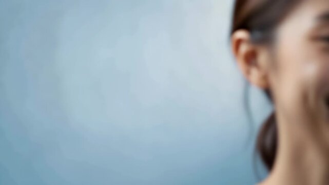 Joyful woman smiling brightly in a happy moment of genuine happiness and positive emotion