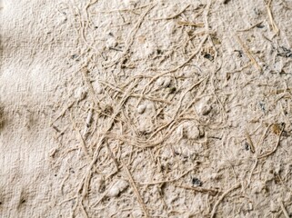 Naklejka premium High texture handmade paper background with dense overlapping plant fiber strands detail