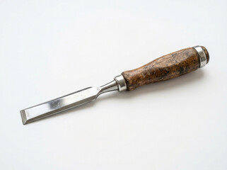 Fototapeta premium Vintage steel wood chisel with a worn wooden handle isolated on a clean white background