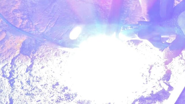 Close‑up view of shielded metal arc welding (stick welding) in action.