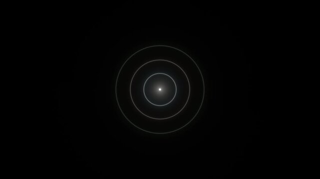 Visual of concentric circles with light in dark background