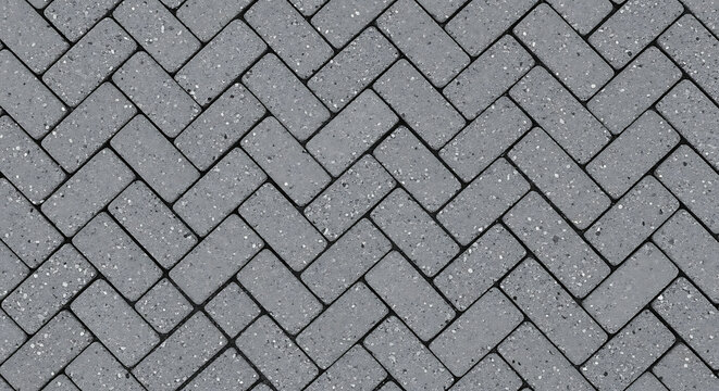 Top view of a grey stone paving herringbone pattern for a modern driveway or walkway