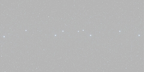 Abstract background with glowing blue star dots and faint cosmic dust isolated on gray background © Maxim