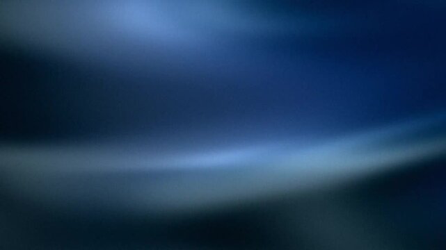 Abstract blue grainy background with soft light and moody atmosphere