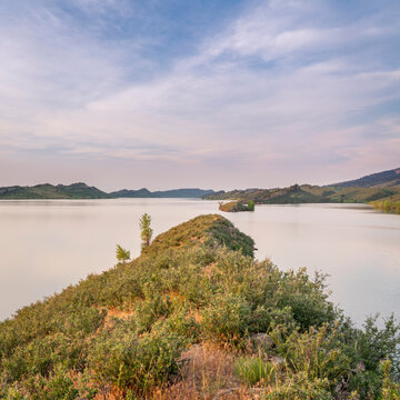summer dawn over Horsetooth Reservoir at foothills of Rocky Mountains in northern Colorado, popular recreation destination in Fort Collins area