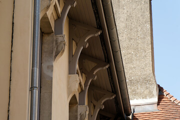 Beaune France building details with wooden corbels and gutter © HighDispersion