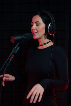 Singer Performs Vocal Track in Recording Studio 