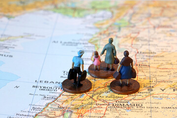 Fototapeta premium Miniature Refugees Leaving their homes in Lebanon during Armed Conflict