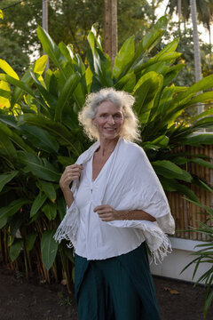 Happy senior Woman Portrait in garden, Healthy Lifestyle and wellness