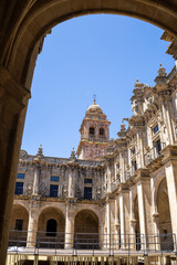 Obraz premium CELANOVA, SPAIN - JULY 6, 2025: Wide and close-up views of the monumental 17th-century cloister at the San Salvador de Celanova Monastery in Ourense, Galicia. The images highlight the intricate stone 