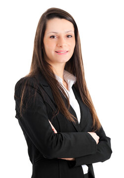 Confident businesswoman standing with arms crossed