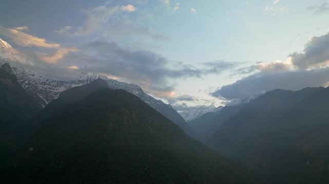 V Shaped Mountain Valley with Fishtail Peak and Misty Forest in Annapurna Nepal
