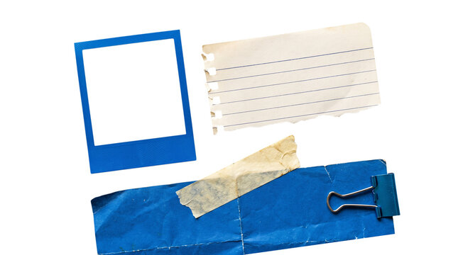 Blue and paper stationery items with polaroid frame isolated on transparent background