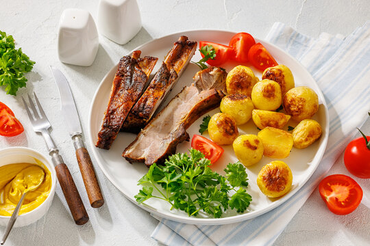 American Backyard Grilled Pork Ribs with potatoes