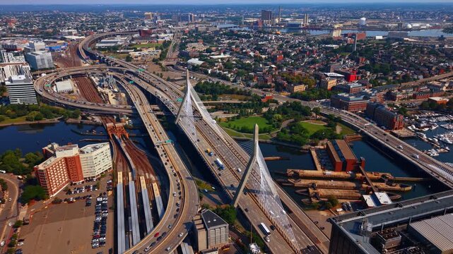 Approaching the Leonard P. Zakim Bunker Hill Memorial Bridge across the Charles River. Beautiful scenery of Boston, Massachusetts, USA at daytime.