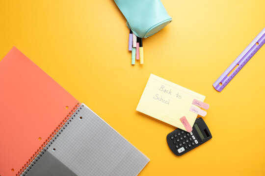 Colorful back to school shopping theme with supplies and to do list notes.
