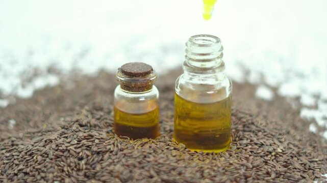 Macro Detail Pan Across Glass Vials of Pure Golden Flaxseed Oil. Alternative Medicine Theme Video Featuring Organic Raw Flaxseed Oil.
