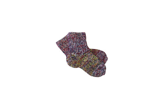 Pair of colorful knitted wool socks isolated on white background, Cozy handmade melange yarn socks, warm winter footwear object cutout