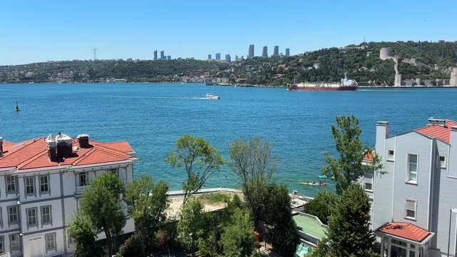 A view showing the historic Anadolu Hisarı fortress and the Bosphorus in Beykoz, Istanbul, Turkey.