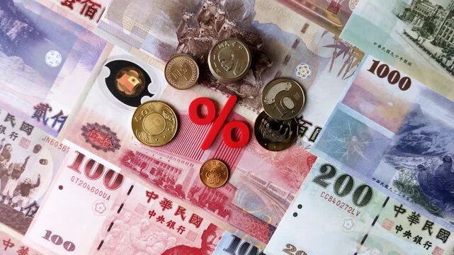 Taiwan, Taiwanese paper banknotes and coins, dollars of various denominations for trade and financial transactions. Taiwanese dollars as a business background for your design