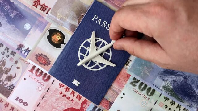 Taiwan, Taiwanese passport or id document with tickets for flight, travel, border crossing. Taiwanese passport and tickets as a background for your design