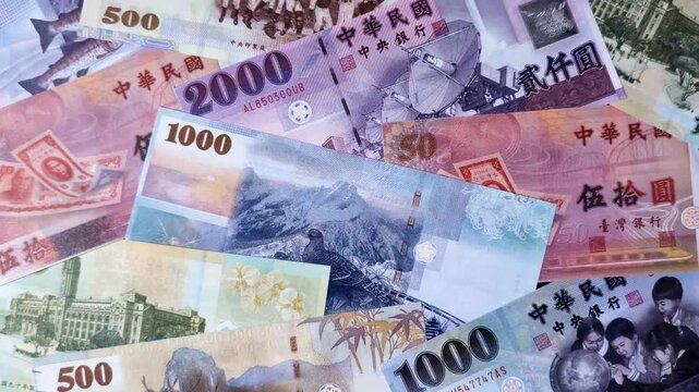 Taiwan, Taiwanese paper banknotes and coins, dollars of various denominations for trade and financial transactions. Taiwanese dollars as a business background for your design