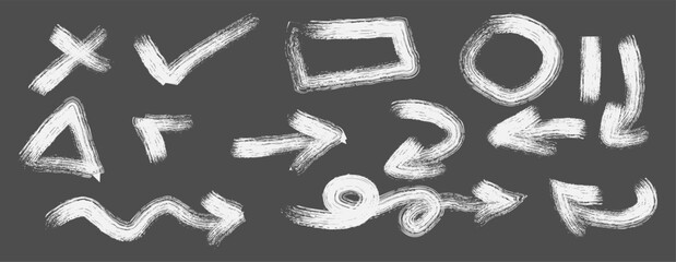 White chalk arrows and shapes on blackboard © Dulu