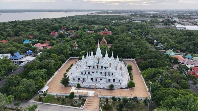 Wat Asokaram. Aerial drone footage of Phra Thutangkha Chedi at Wat Asokaram in Samut Prakan Thailand. Aerial view Thai landmark or travel destination for tourist who seeing Thai architecture culture.