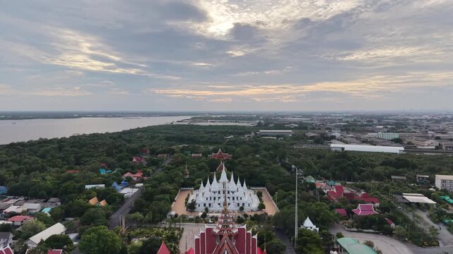 Wat Asokaram. Aerial drone footage of Phra Thutangkha Chedi at Wat Asokaram in Samut Prakan Thailand. Aerial view Thai landmark or travel destination for tourist who seeing Thai architecture culture.