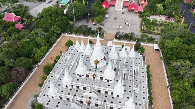 Wat Asokaram. Aerial drone footage of Phra Thutangkha Chedi at Wat Asokaram in Samut Prakan Thailand. Aerial view Thai landmark or travel destination for tourist who seeing Thai architecture culture.