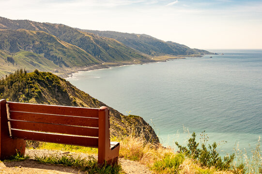 Bench overlook view Pacific Ocean water sea reflection contemplate highway 1 pch