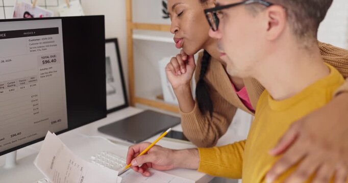Couple checking bill and budget on computer. They read an online invoice, check payment and expenses at a home office, tracking finance and savings. Concept of simple family finance planning.