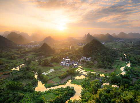 Golden sunset over Yangshuo's winding Li River valley