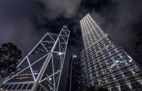 Bank of China Tower and city buildings at night