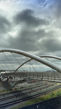 Modern Steel Arch Architecture of the Celtic Gateway Footbridge in Holyhead, Anglesey, North Wales, UK
