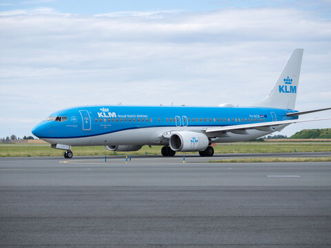 PRAGUE, CZECH REPUBLIC - JULY 12, 2026: A KLM Royal Dutch Airlines Boeing 737-800 passenger jet (registration PH-BCB) taxiing on the airport runway under an overcast sky.