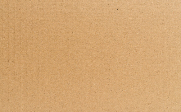 Cardboard texture, light brown kraft paper close up  background