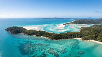 Whitsunday Islands Paradise: An breathtaking aerial view reveals the pristine white sand swirling in turquoise waters, fringed by lush green islands under a clear blue sky. A true tropical escape.