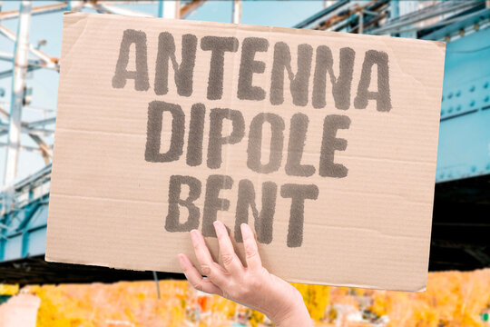"Antenna Dipole Bent" Aerial element deformed from wind. ANTENNA. DIPOLE. BENT. AERIAL. WIND.