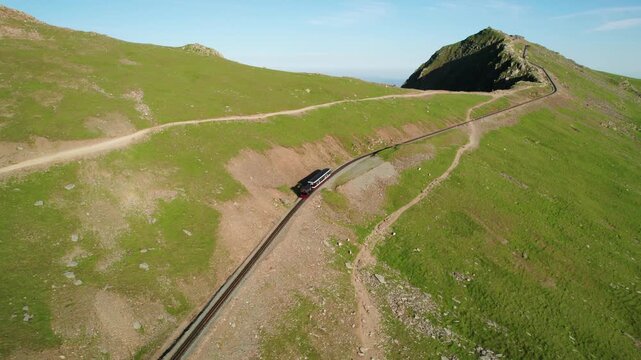 Snowdon Summit Railway, tourist mountain train in the highest peak of Wales. aerial view in summer